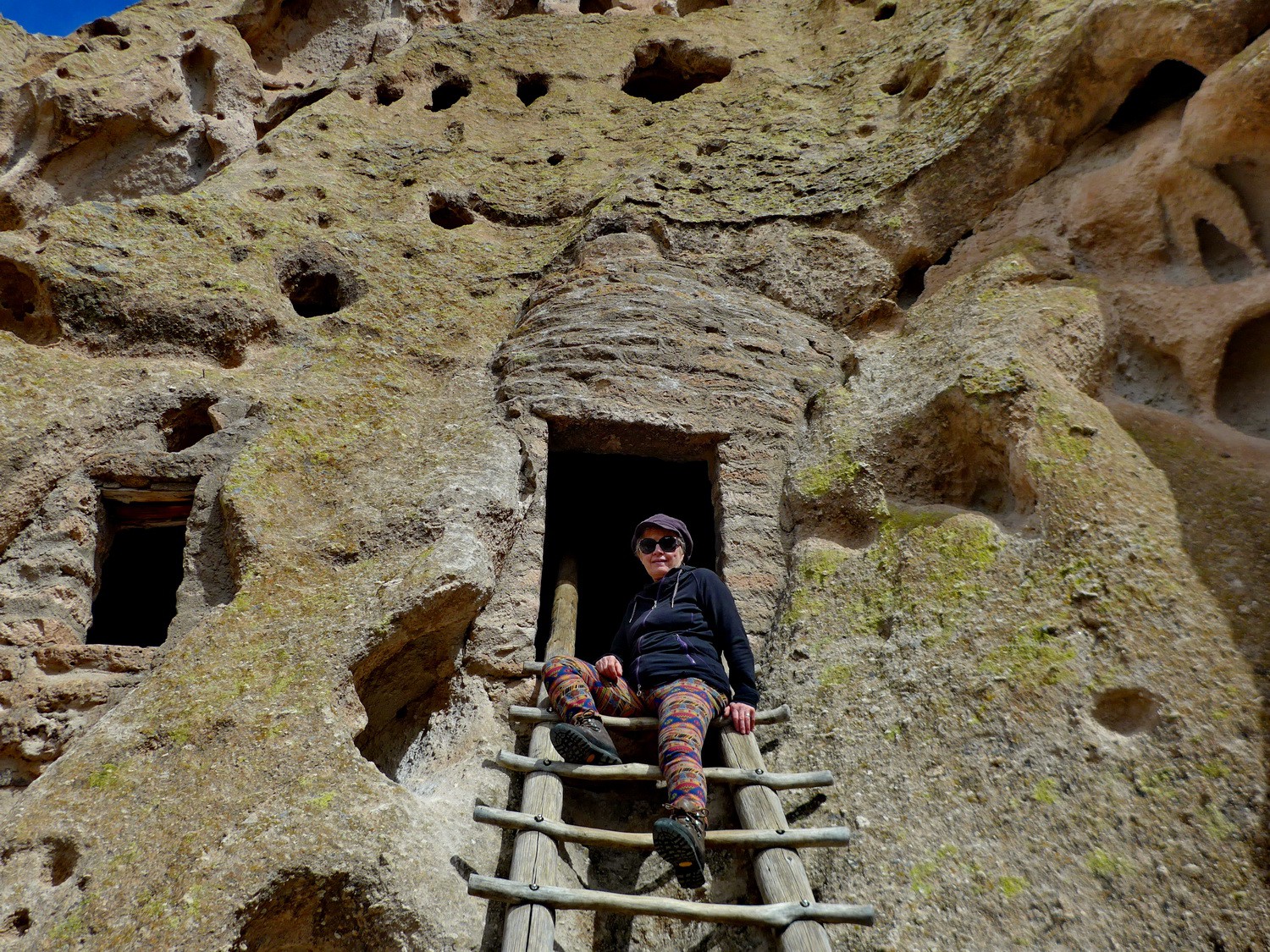 Marion in front of a cave house in the Frijoles Canyon in the Bandelier Natonal Monument